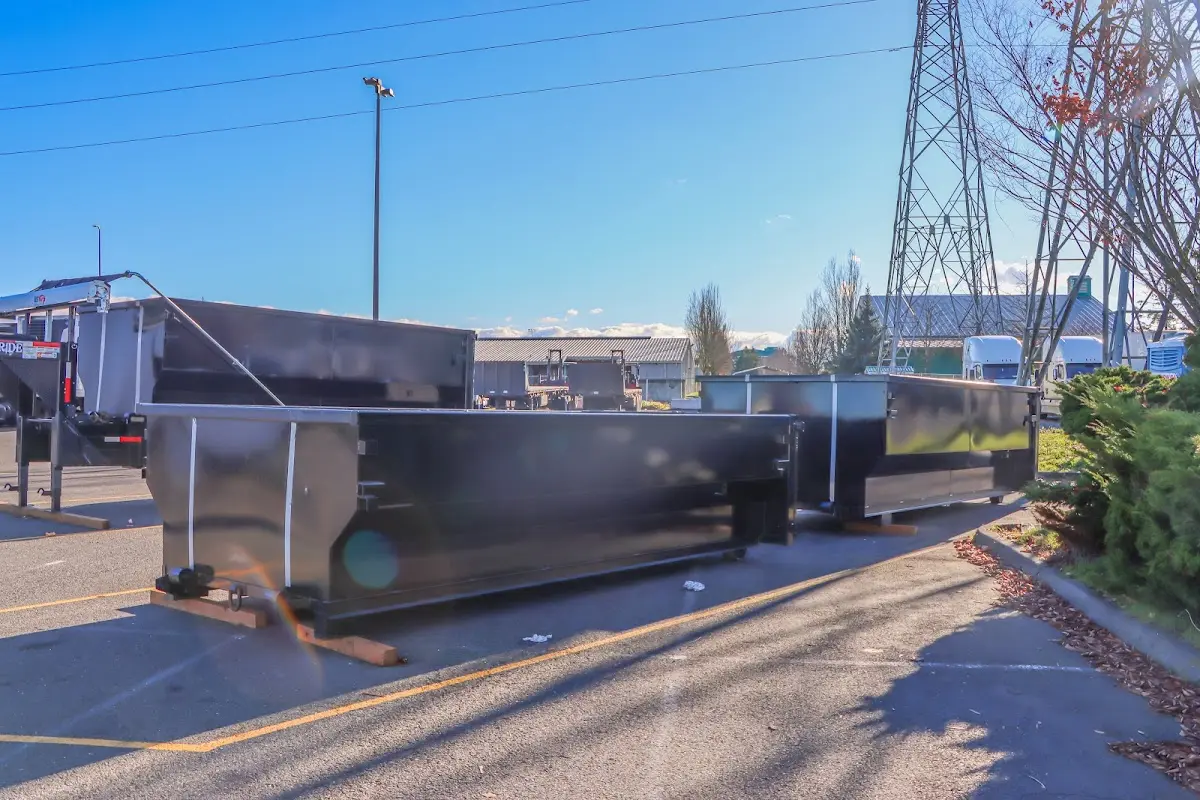 Roll-off dumpster ready for waste disposal at job site for 4 Yard Dumpster Rental in Maywood